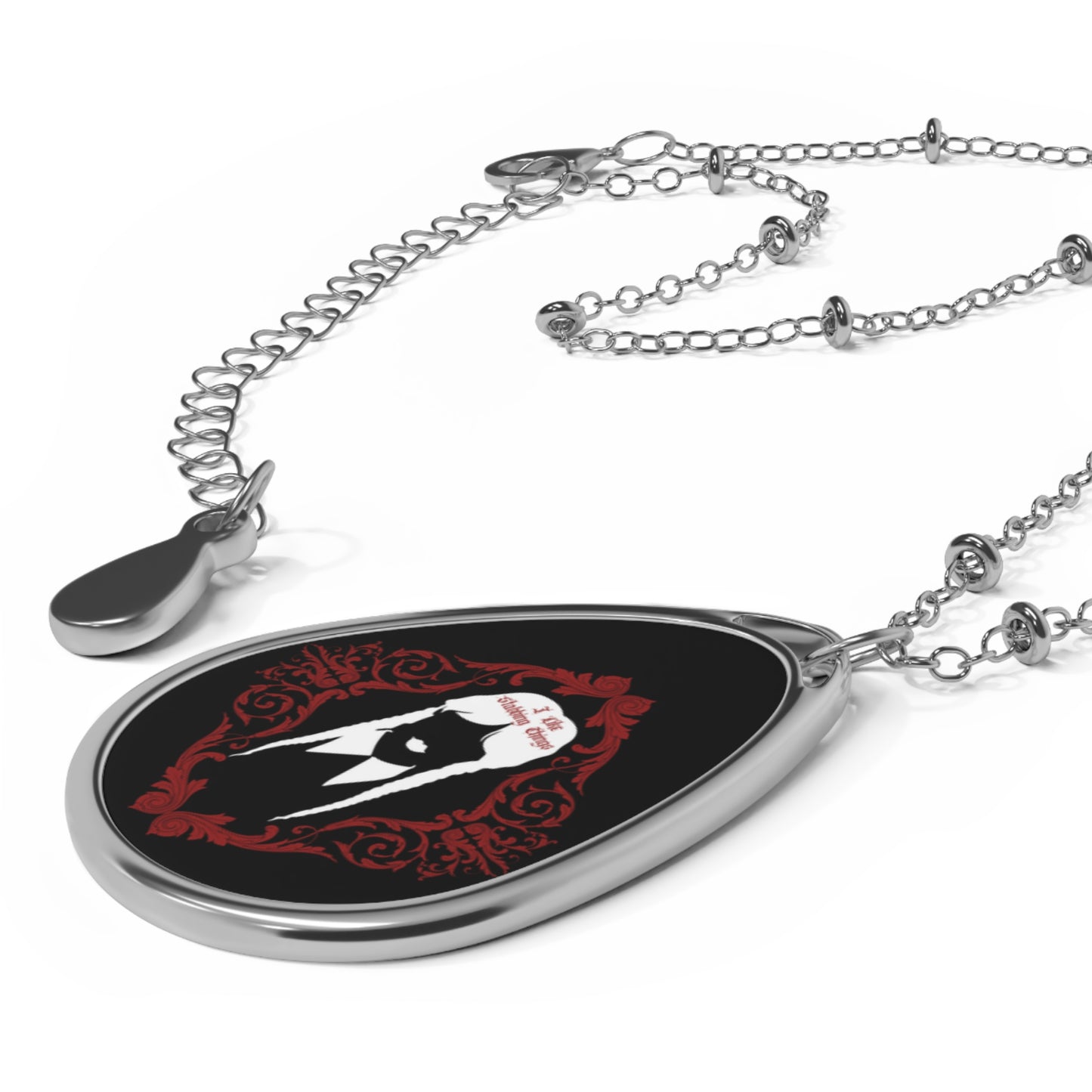 W. Addams | Stabbing Things | Oval Necklace